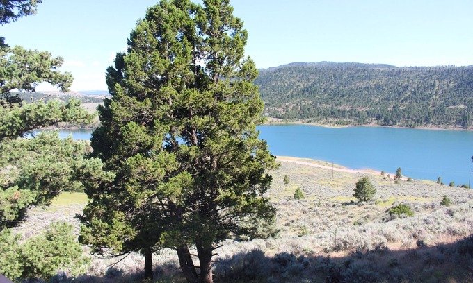 White Sulphur Springs House | Relax & unwind in the mountains with a beautiful view of Newlan Creek Reservoir