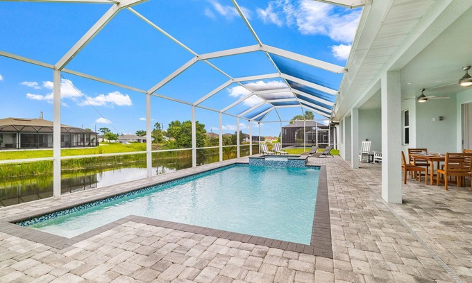 Mariner House | Relax & Unwind: Canal-Front Escape with Pool & Lanai