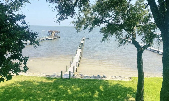 Carrabelle House | Relax with the whole family at this cozy place to stay on the water.