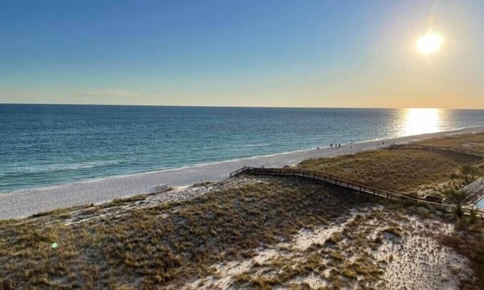 Navarre Beach Condo | Relaxation, perfect sunsets, and emerald waters await from our beach front condo