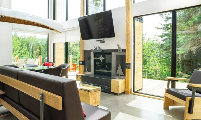 Mauricie House | Relaxing Escape w/Fireplace, BBQ & Serene Du Loup River Backdrop