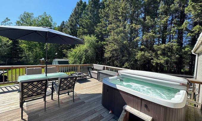 Upper Peninsula House | Relaxing getaway with fenced in yard & hot tub!