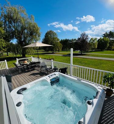 Athens House | Relaxing Pondfront Escape with Hot Tub & Outdoor Fire Deck