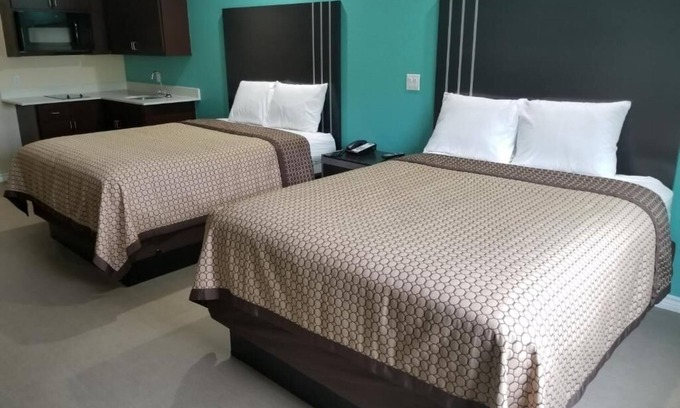 Bay City Hotel | Relaxing Two Queen Bedroom and Kitchenette in Quiet Bay City Location, 2 Units