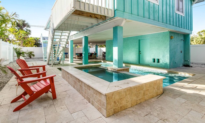 Holmes Beach House | Remodeled duplex with heated private pool - close to beach, dogs welcome
