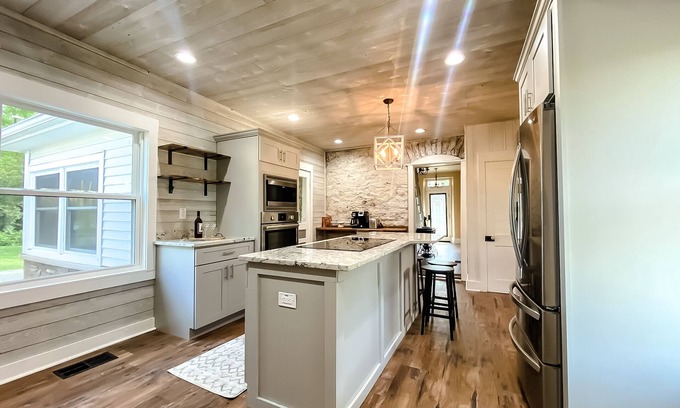 Latonia House | Remodeled historic home located on winery & working farm