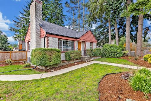 Fauntleroy House | Remodeled Home Fenced Yard Outdoor Fireplace