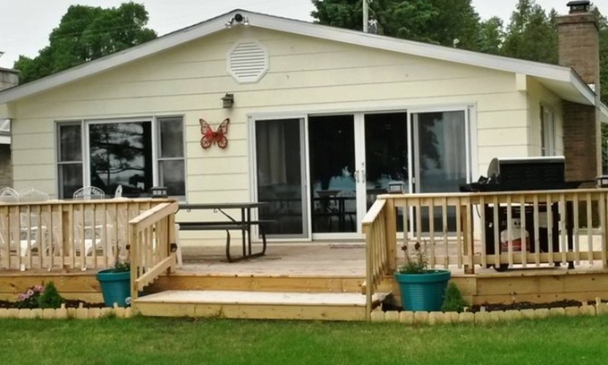 Onekama House | Remodeled, waterfront home on Portage Lake with dock & firepit - 2 dogs OK