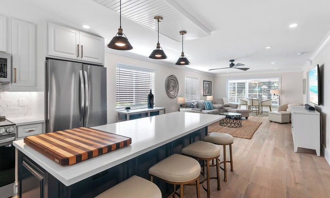 Royal Harbor Condo | RENOVATED 2 Bed, 2 Bath 1st floor with heated pool on the bay!