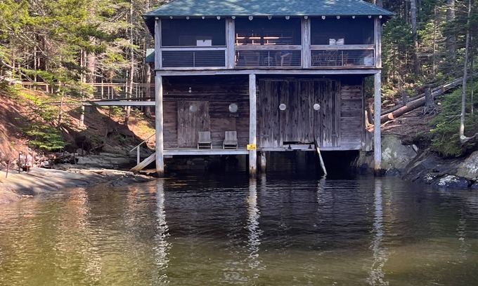 West Point Cabin | Renovated 3-BR boathouse built atop water in quiet cove; private float & trails