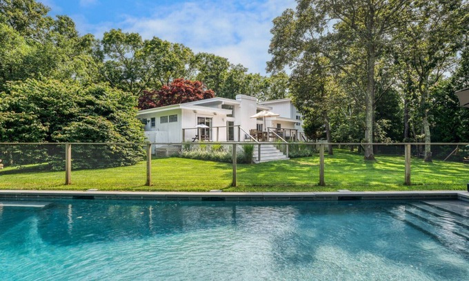 Village of East Hampton House | Renovated modern mid-century ranch, polished landscaping, heated saltwater.
