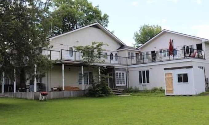 Port Stanton House | Resort, Lakefront room, Hot Tub, Pool, Sauna #6