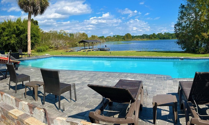 Casselberry House | Resort like Lake House on 2+ acres, Golf Course, pool, fishing dock, pool table