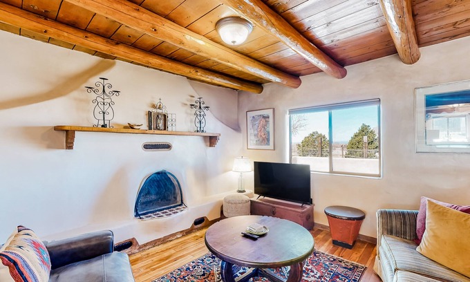 Taos House | Restored 1938 adobe with mountain view & kiva fireplace - dog-friendly