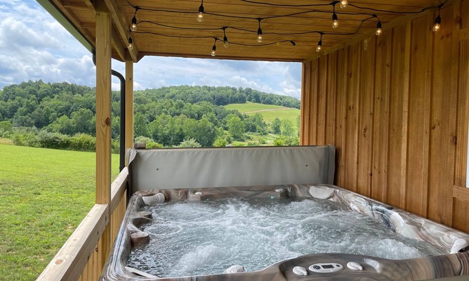 Logan Cabin | Ridge top cabin with hot tub and movie theater