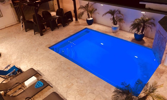 Rincon House | Rincon's 5 star Luxury Adult Only Villa Steps from beach, shops and dinning.