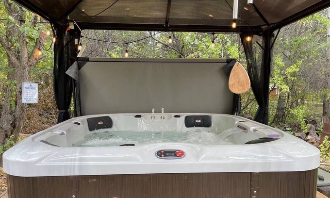 St. Andrews House | River front vacation home with outdoor hot tub & Karaoke
