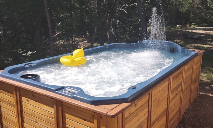 Crystal Falls Cabin | RIVER RENTAL NEW LOG CABIN-POOL SPA ON THE PAINT RIVER-DOCK-CANOES FISH GOLF ORV