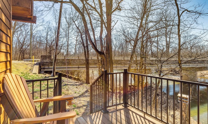 Covington Cottage | Riverfront Covington Cabin w/Deck & Fire Pit!