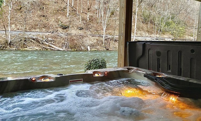 Bryson City Cabin | RIVERFRONT Retreat with HOT TUB on Nantahala River