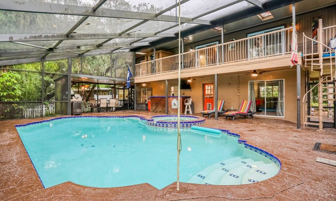 Temple Terrace House | Riverfront retreat with pool/spa, outdoor kitchen, firepit, dock, sauna & games