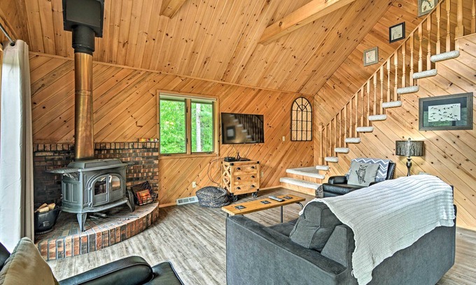Mayfield Cabin | Riverfront Traverse City Cabin Near Snowmobiling!