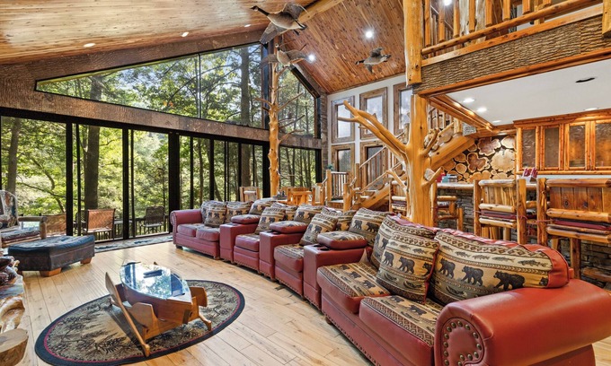 Ellijay Cabin | Riverside Luxury: Hot Tub, Fire Pit & Fishing Dock! Game Room, Fireplace!