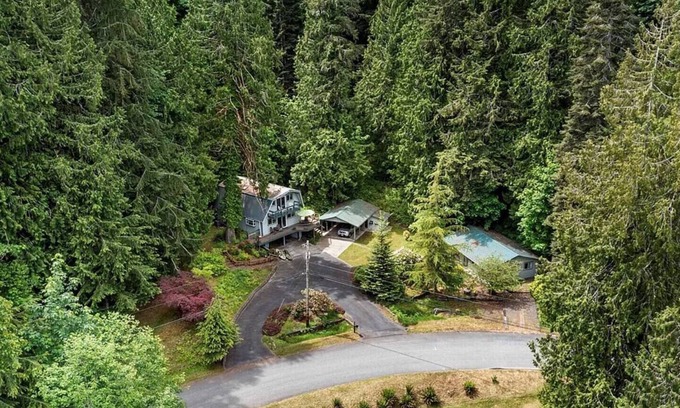 Brinnon House | Riverside luxury, with a hot tub, in the woods.