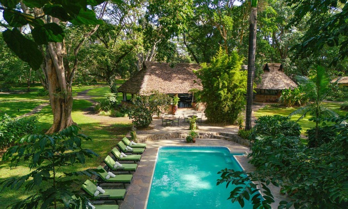 Arusha Cabin | Rivertrees Country Inn