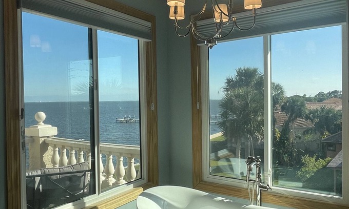 Titusville House | Rocket Launches and River Views! Multiple balconies, huge screened in porch.