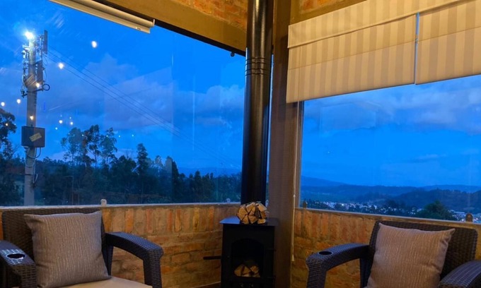 Chiquinquira Apartment | Romantic cabin with city view, 10 min from downtown