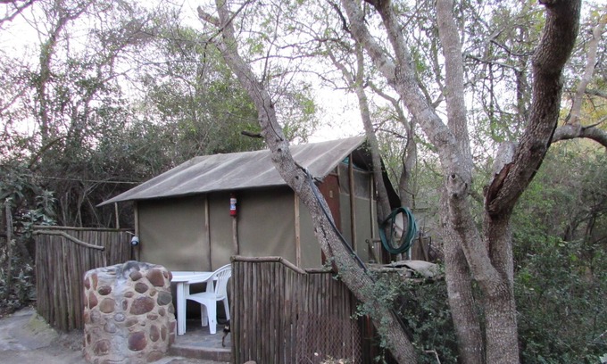 Thorny Bush Game Reserve House | Romantic canvas pad on river, share shower with monkeys and listen to the lions