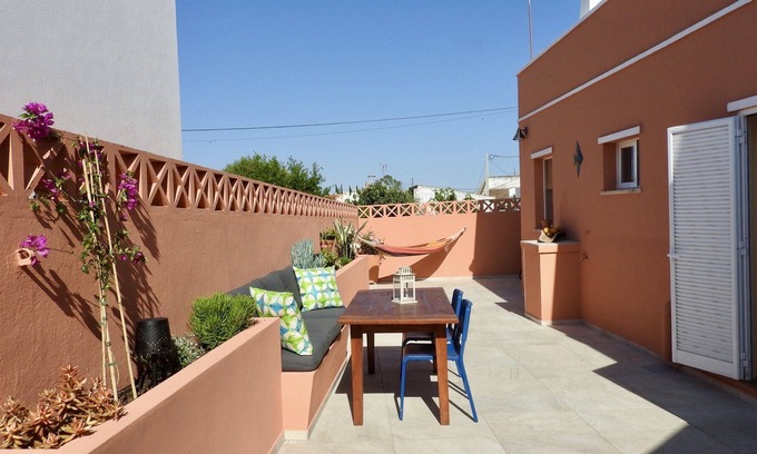 Azinhal House | Romantic village house with spacious roof terrace and patio