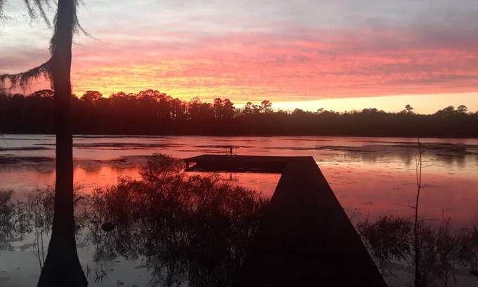 Pinetta Cottage | ROOF DAMAGE FROM HURRICANE Florida Waterfront Home, Fishing & Pet Friendly