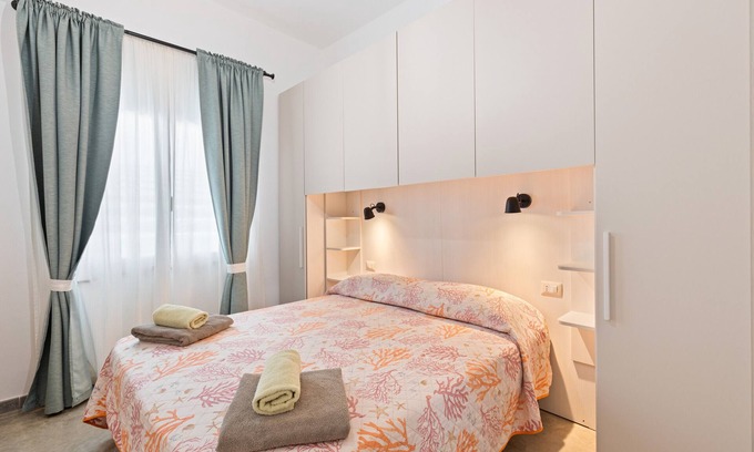 Riola Sardo Apartment | Room '40°Parallelo - Economy 5' with Shared Garden, Wi-Fi and Air Conditioning