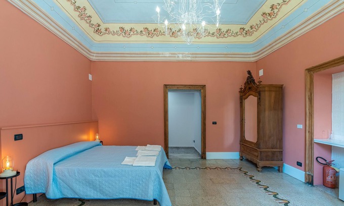 Santa Maria di Licodia Apartment | Room 'Civico 46 - Red' with Shared Terrace, Wi-Fi and Air Conditioning
