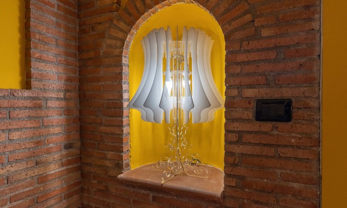 Santa Maria di Licodia Apartment | Room 'Civico 46 - Yellow' with Shared Terrace, Wi-Fi and Air Conditioning