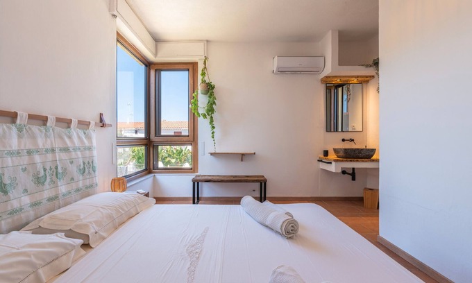 Sarroch Apartment | Room 'Istè' with Sea View, Private Terrace and Air Conditioning