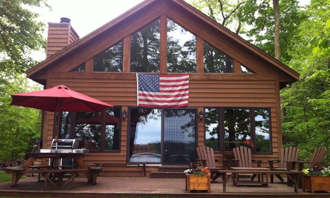 Grantsburg Cabin | Room to Relax on Big Wood Lake with Pontoon Boat Option! Available Year Round!