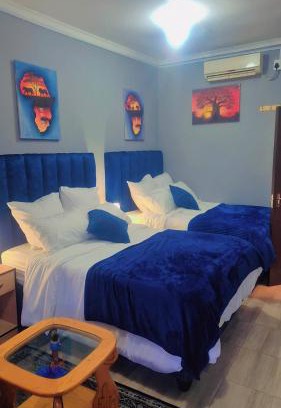 Rustenburg House | Royal Blue Family Haven