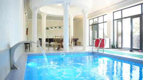 Shymkent House | Royal Pool Cottage