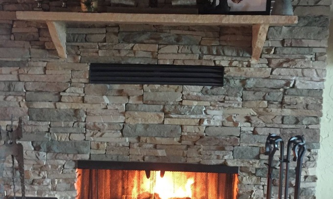 Munds Park Cabin | Rustic Cabin with modern amenities, large front deck surrounded by pine trees.