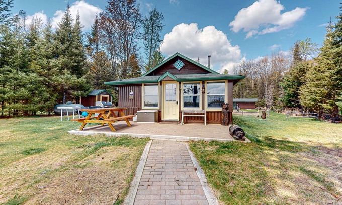 St Germain Cabin | Rustic Cozy lakefront Cabin with dock, fire pit, gas grill, W/D & quiet location