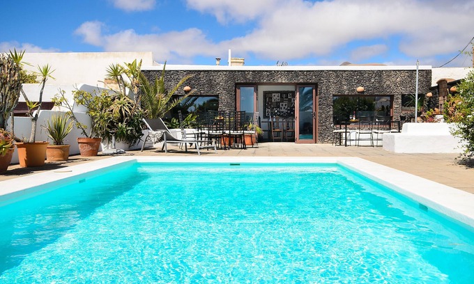 Guime House | Rustic Home Short Drive from Beach with Pool, Terraces & Garden