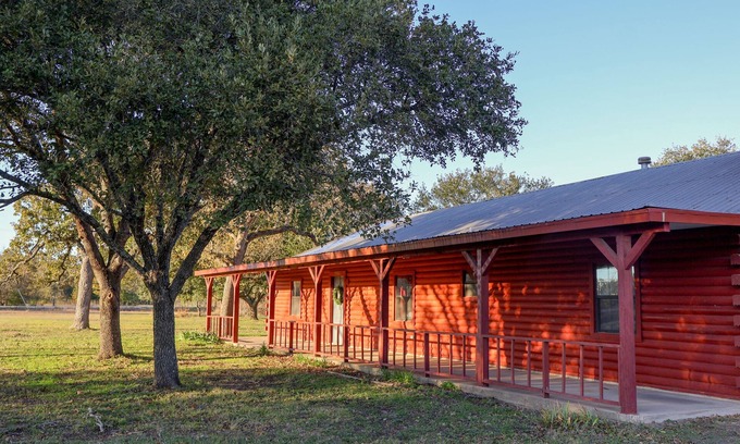 College Station House | Rustic Log Cabin Near Texas A&M – Spacious Retreat with Pond & Firepit!