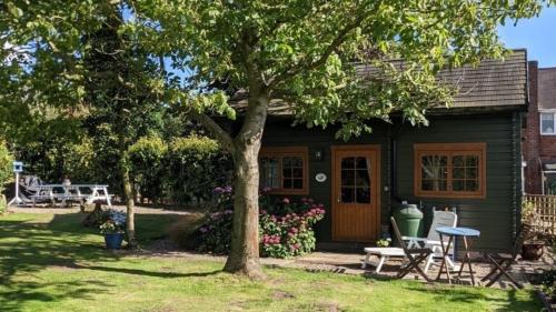 Harmer Hill House | Rustic Log Cabin - Dog Friendly - Sleeps 2 - Views