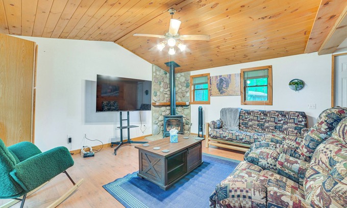 Rose City Cabin | Rustic Michigan Lakeside Cabin w/Private Dock!