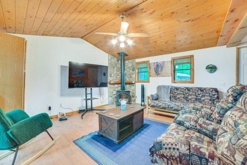 Rose City House | Rustic Michigan Lakeside Cabin with Private Dock!