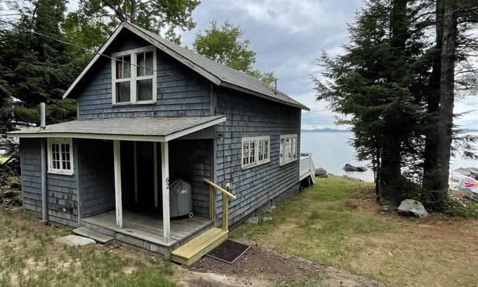 Standish Cottage | Rustic shorefront cottage with a small sandy beach