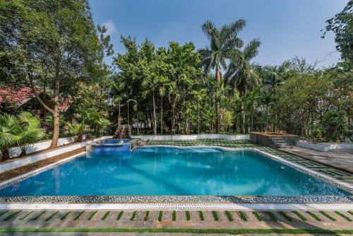 Wadgaon Villa | SaffronStays Foresta By The Lake, Kamshet -7 acres estate with lake on 3 sides, pool, veg only multi cuisine meals
